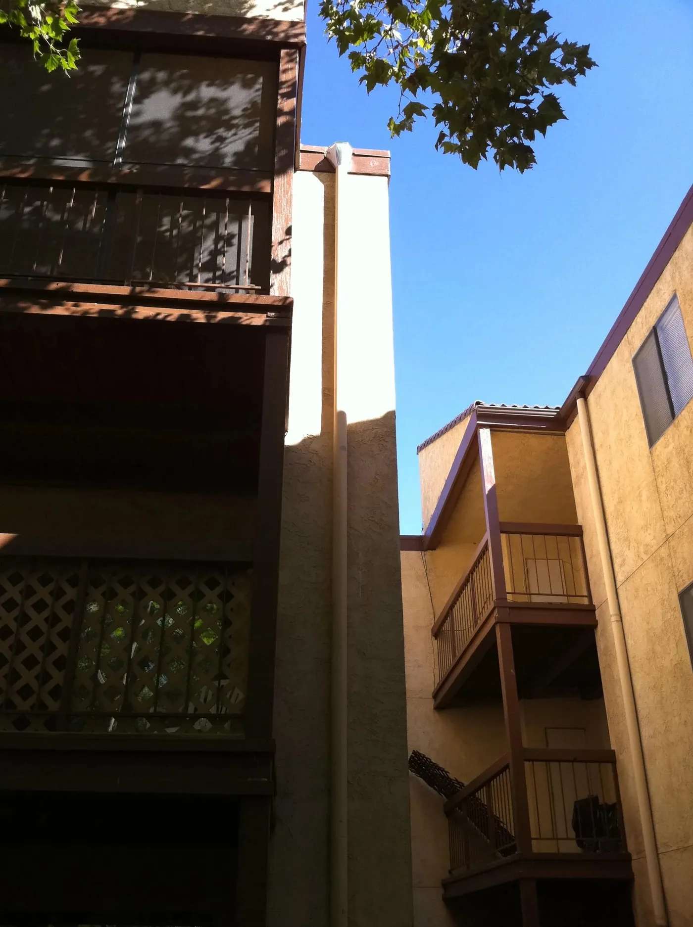 Multi-family residential courtyard with continuous gutter system